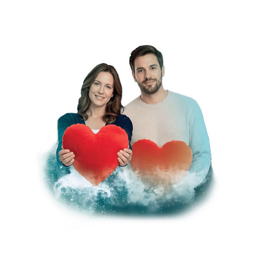 Muž a žena držící velké červené srdce