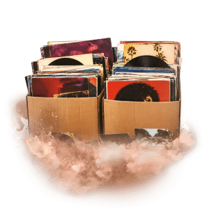 Dvě krabice plné vinylových desek s různými obaly, připravené pro burzu LP a CD.